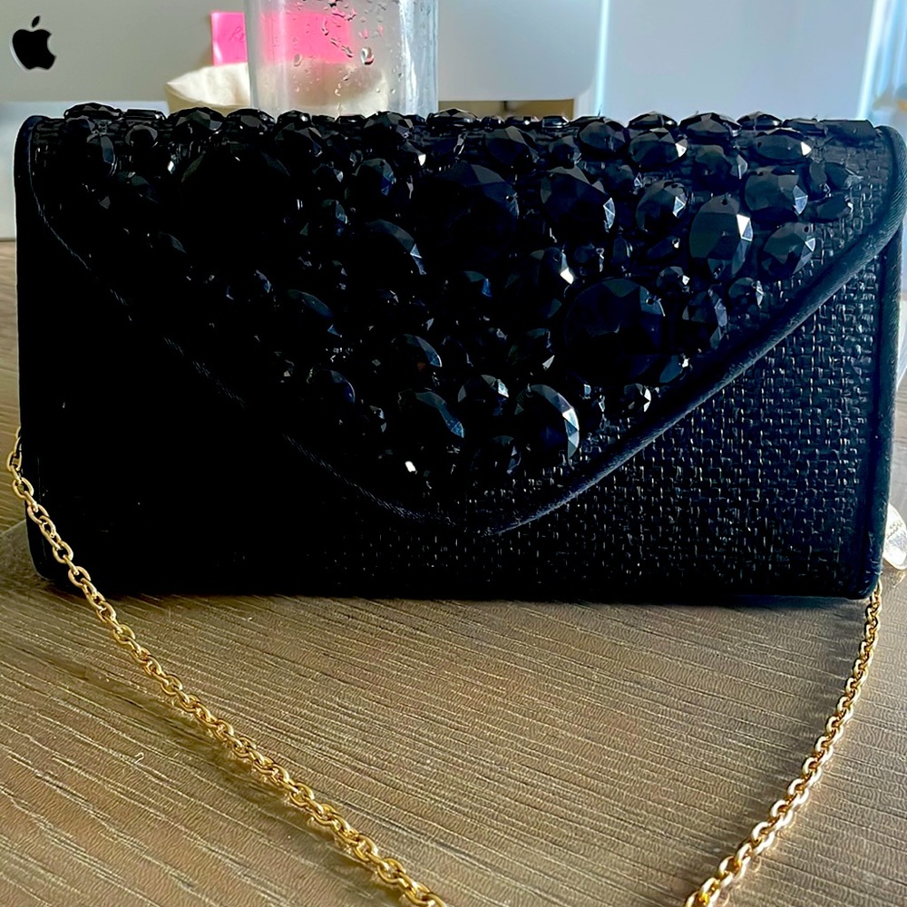 Never Used Big Buddha clutch- no signs of wear or tear.